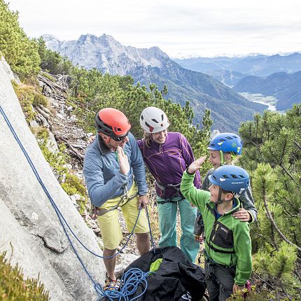 Family outing climbing in Waidring